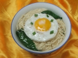 C:\Users\qxb-810\Desktop\英语闽教三年级上册\Unit 4 Age and Phone Numbers\Part A\素材\birthday noodles.jpg